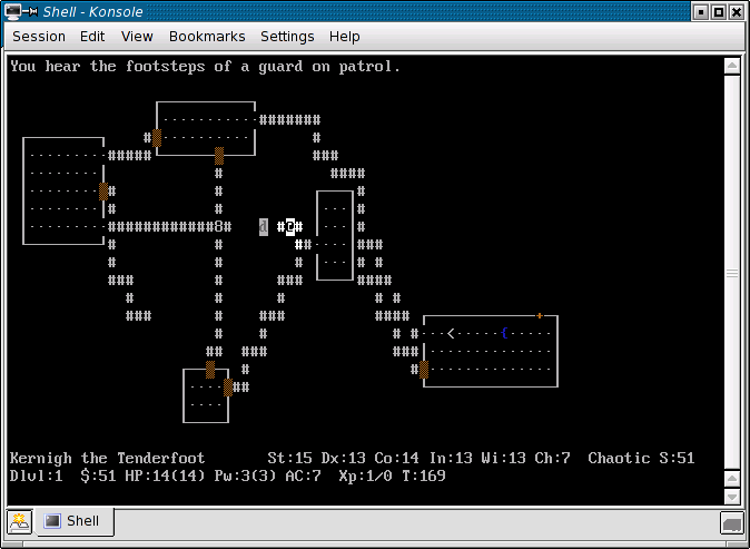 NetHack 3.4.3 in Konsole, with the adventurer and pet dog in a partly explored dungeon